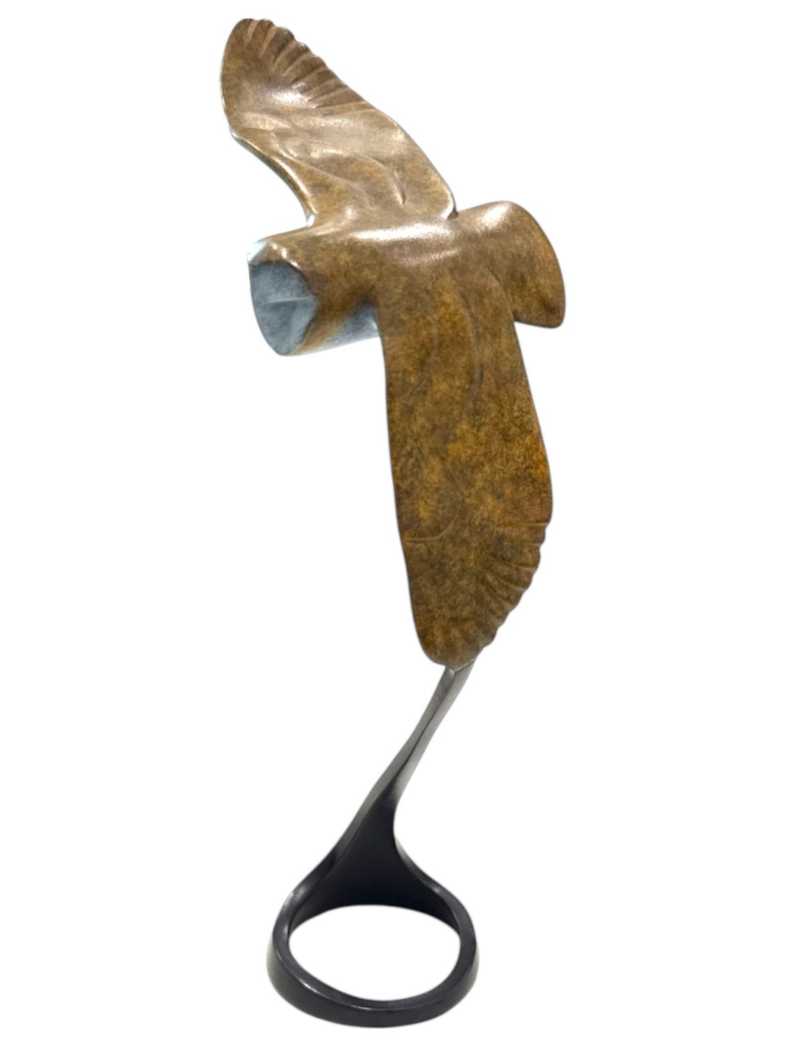 Decorative sculpture of a bird in flight on a white background