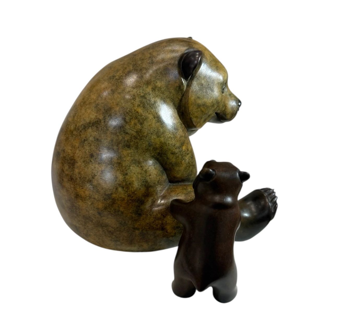 Bronze sculpture of a bear and cub on a white background