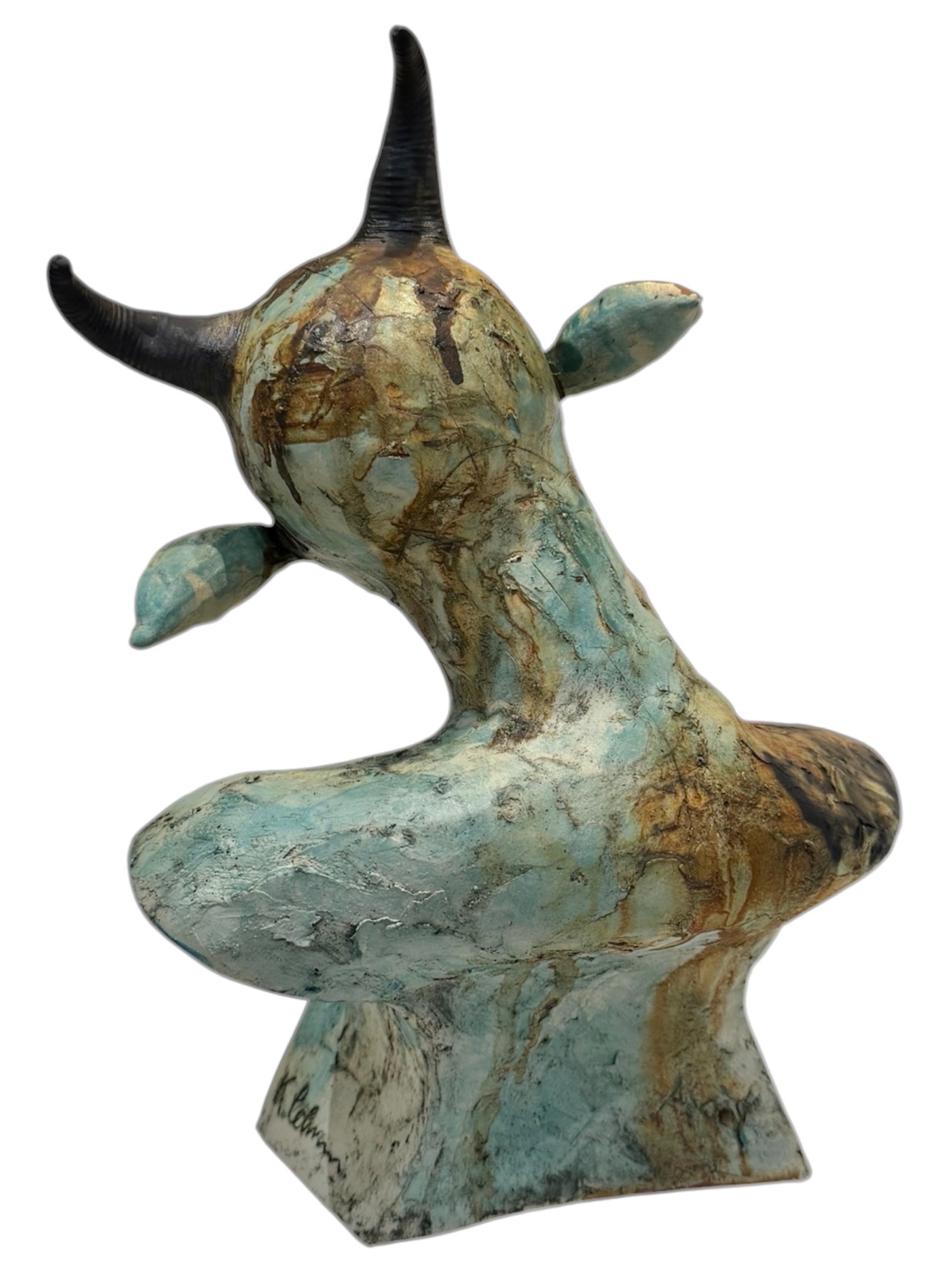 Ceramic sculpture of a stylized animal with a white background