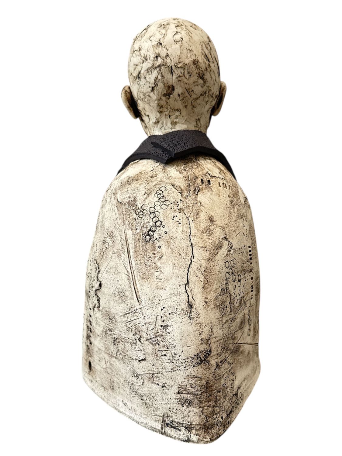 Statue of a person with a black scarf on a white background