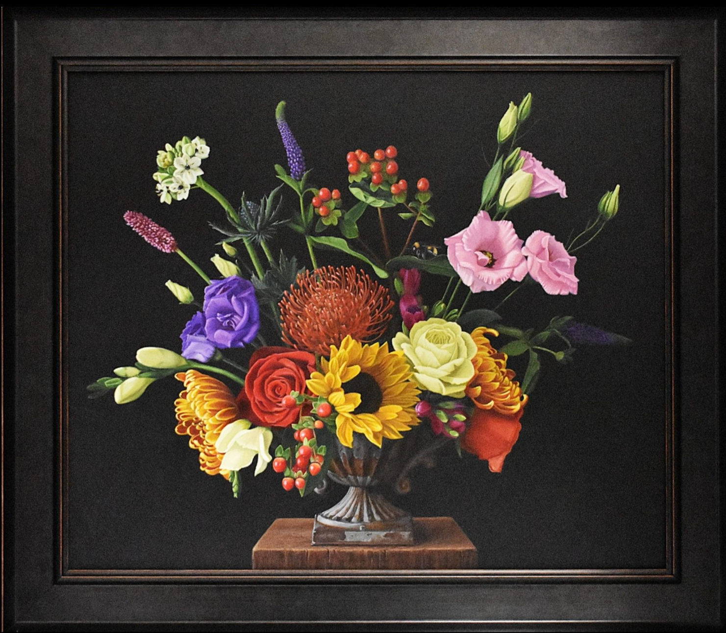 Framed still life painting of a bouquet of flowers on a dark background