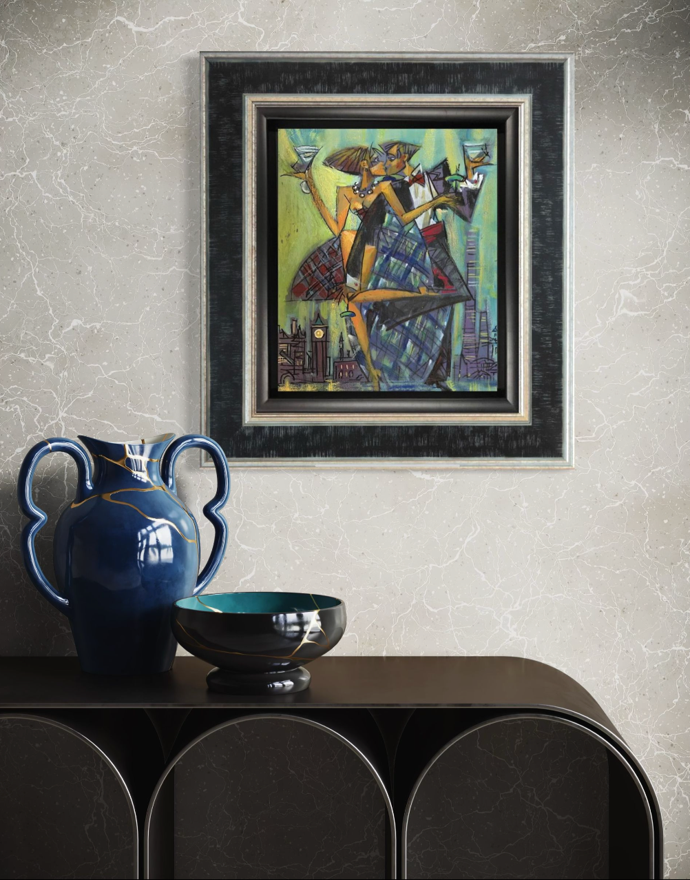 Framed abstract painting on a wall with decorative vases and bowl below.