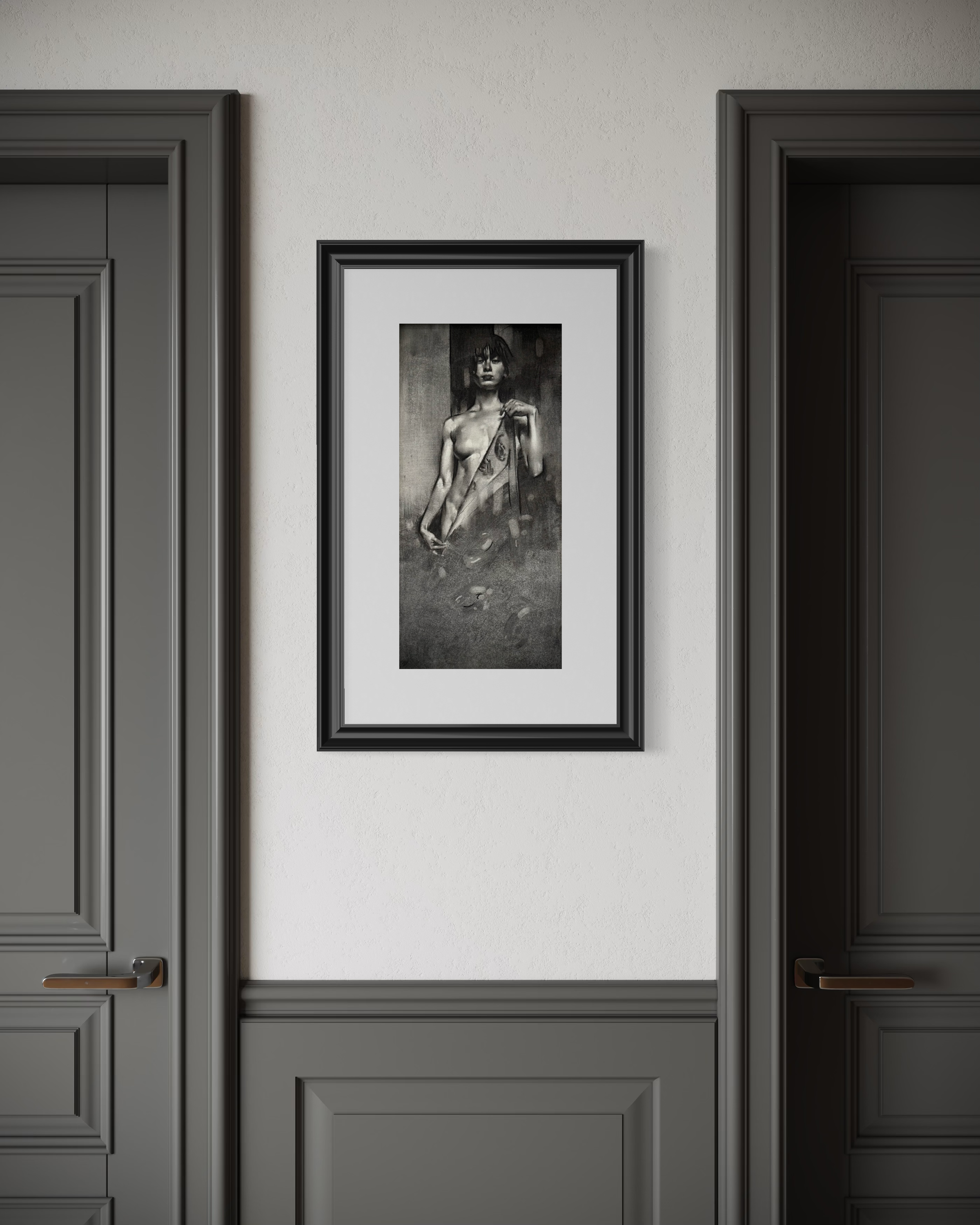 Framed black and white artwork on a wall between two dark doors.