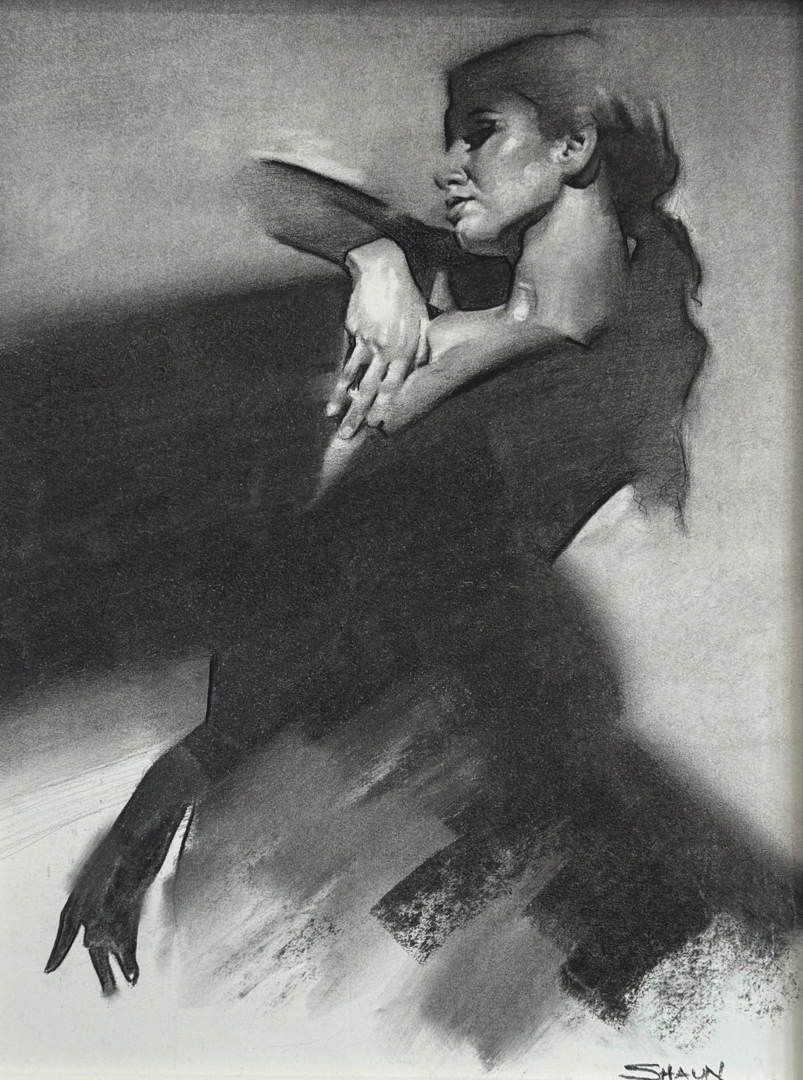 Black and white charcoal drawing of a woman dancing